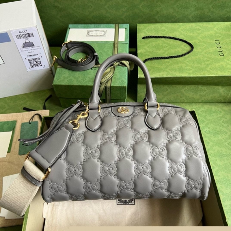 G*u*i top handle bags